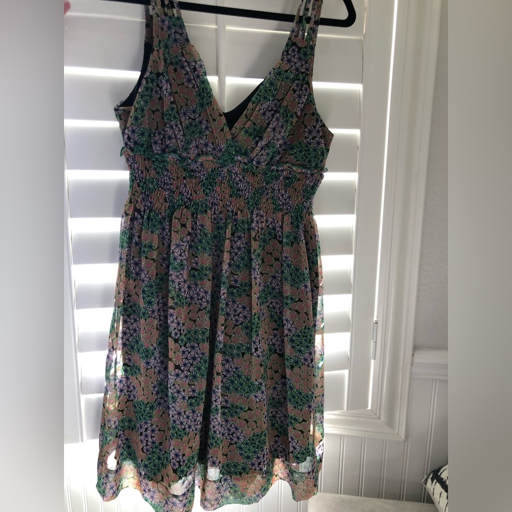 Sheer Lined Floral Mini Dress by Johnny Martin.